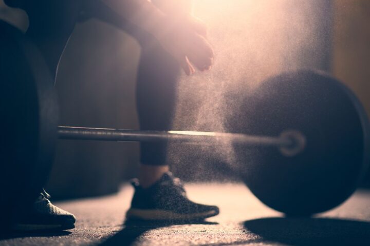 An athlete preparing to lift a barbell